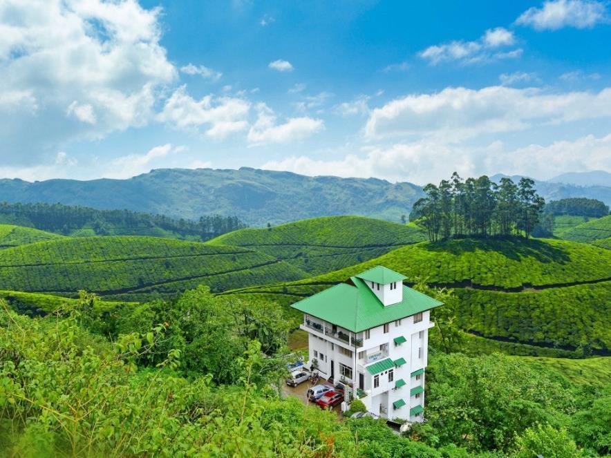 Hotel Emerald Inn Муннар Экстерьер фото
