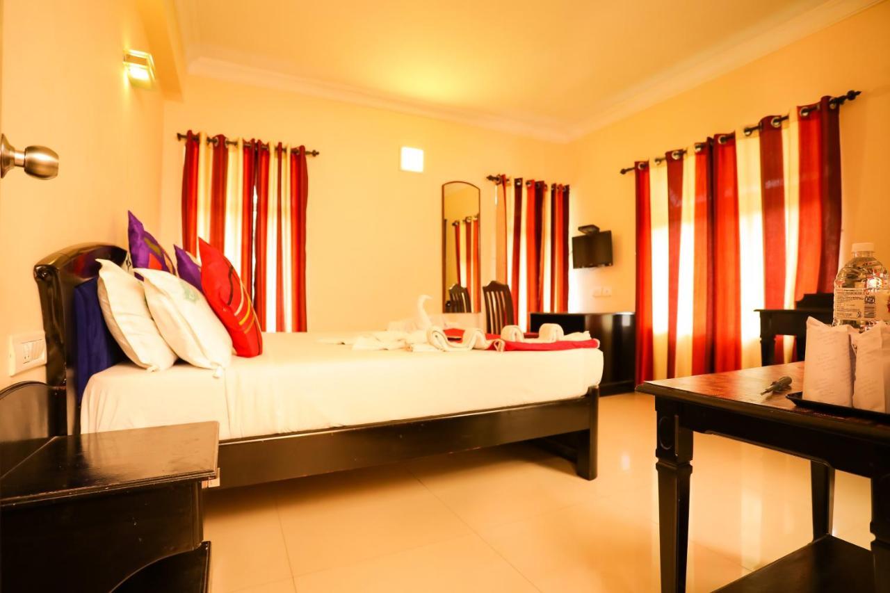 Hotel Emerald Inn Муннар Экстерьер фото