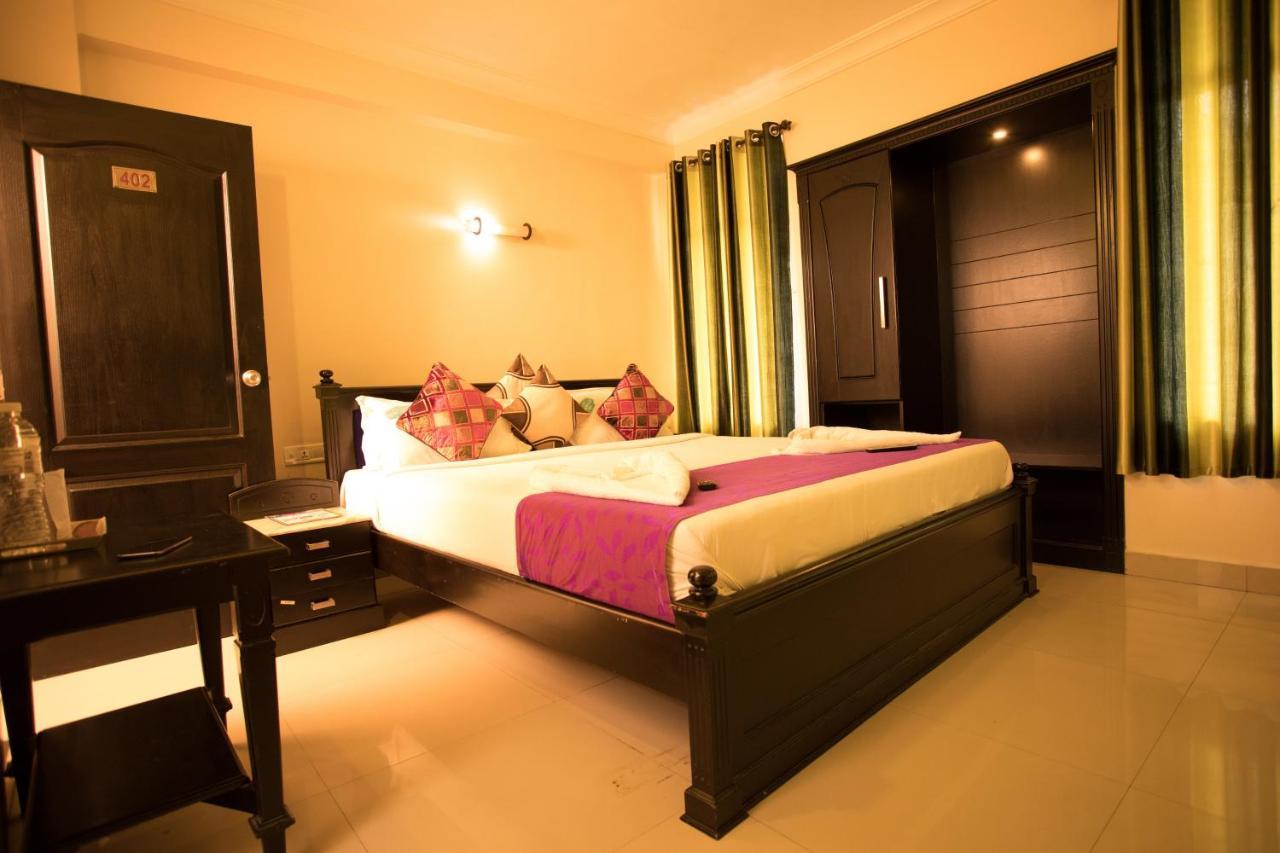 Hotel Emerald Inn Муннар Экстерьер фото