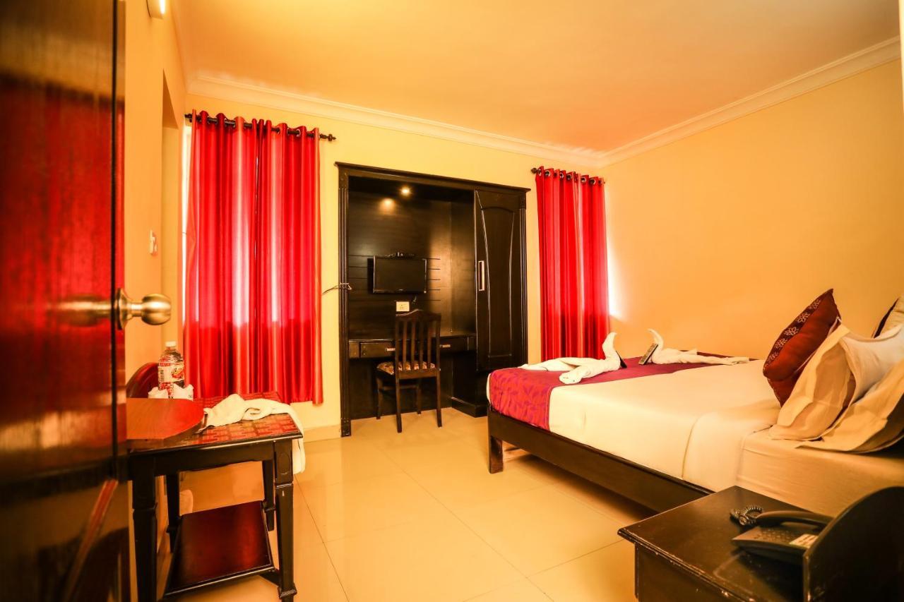 Hotel Emerald Inn Муннар Экстерьер фото