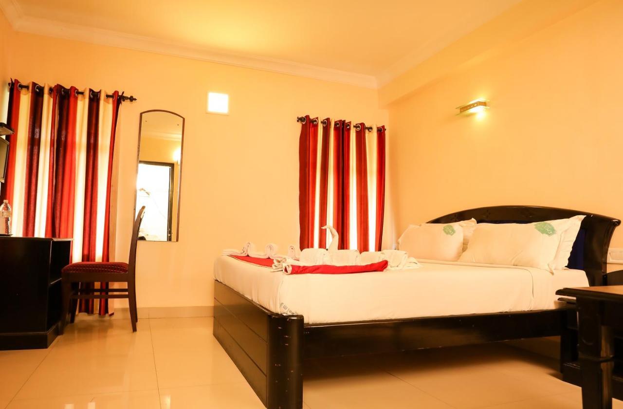 Hotel Emerald Inn Муннар Экстерьер фото