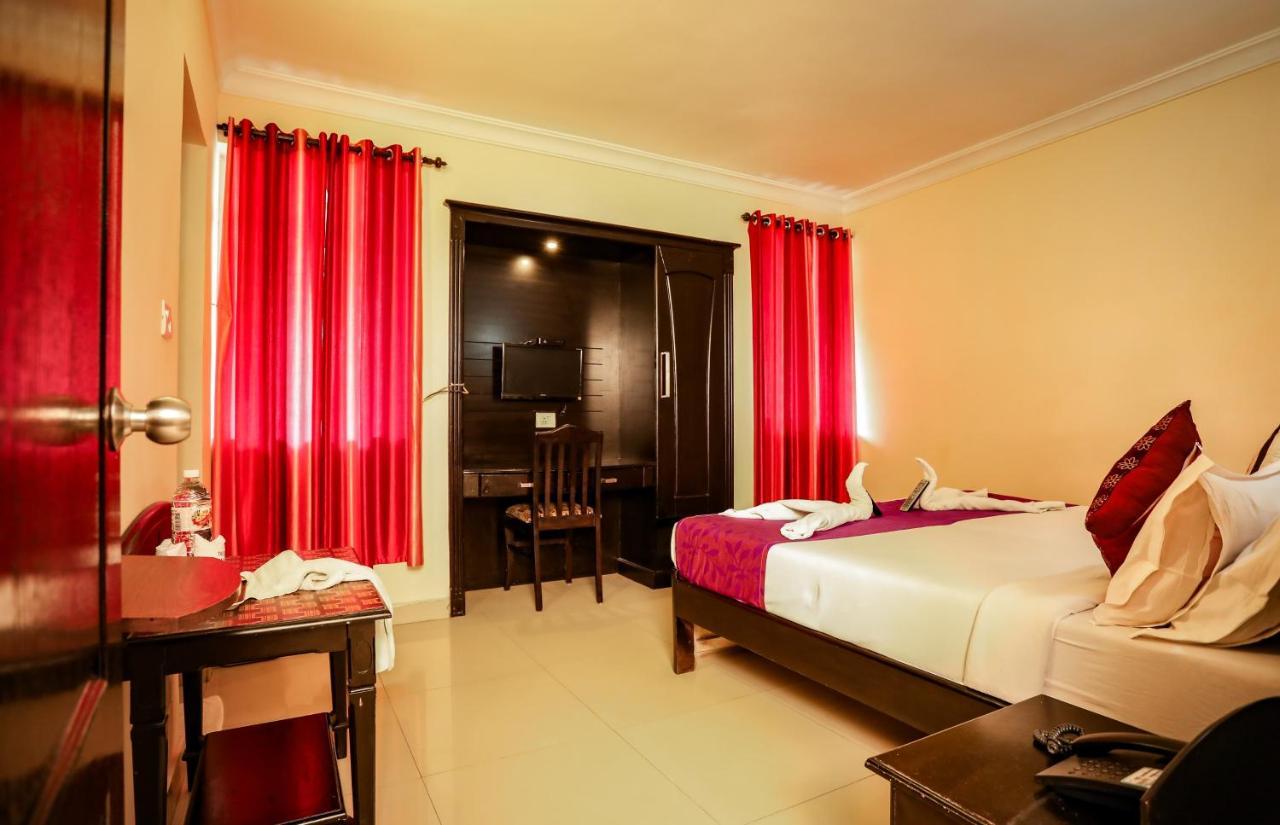 Hotel Emerald Inn Муннар Экстерьер фото